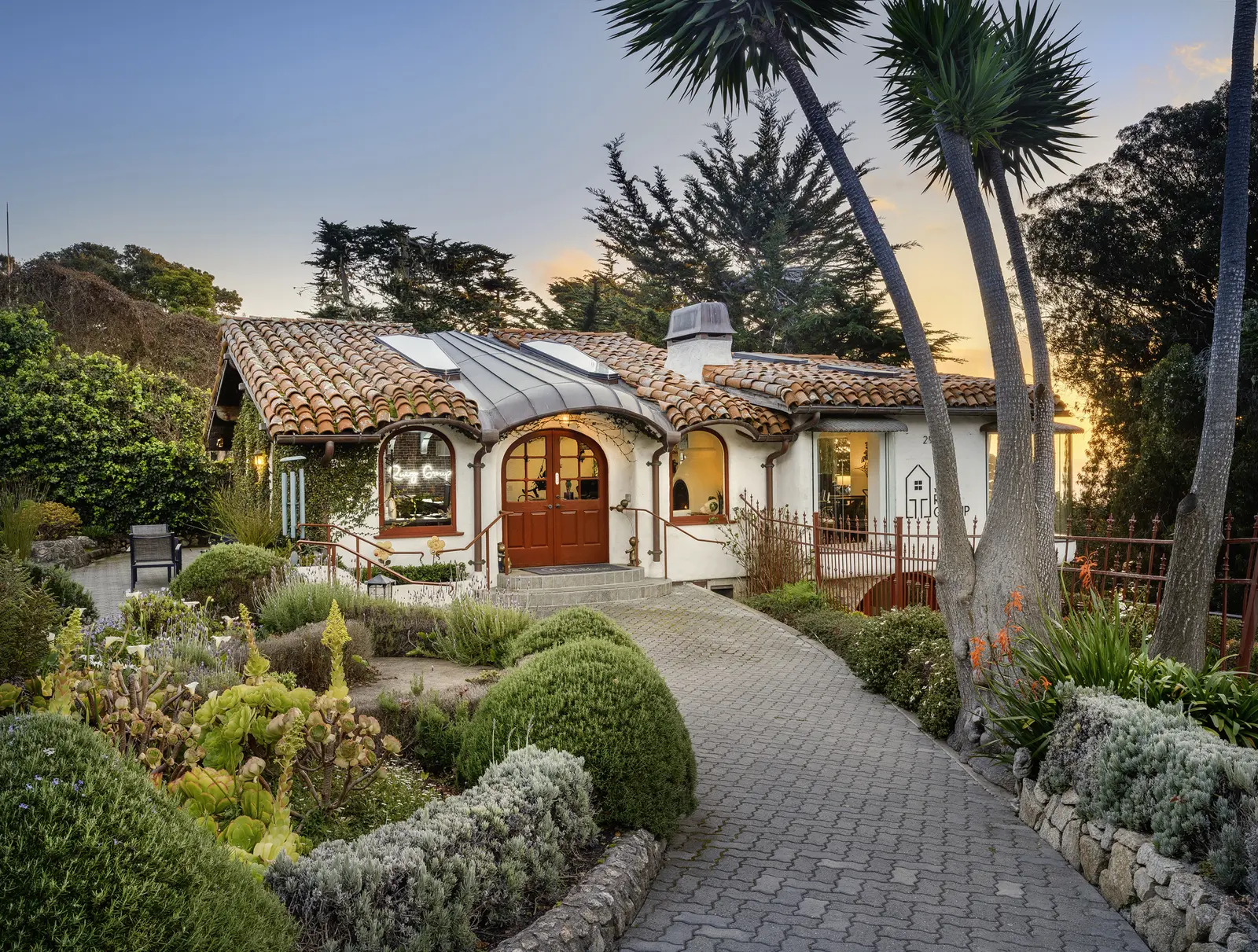 Storybook Carmel cottage at twilight — architectural photography by Manny Espinoza