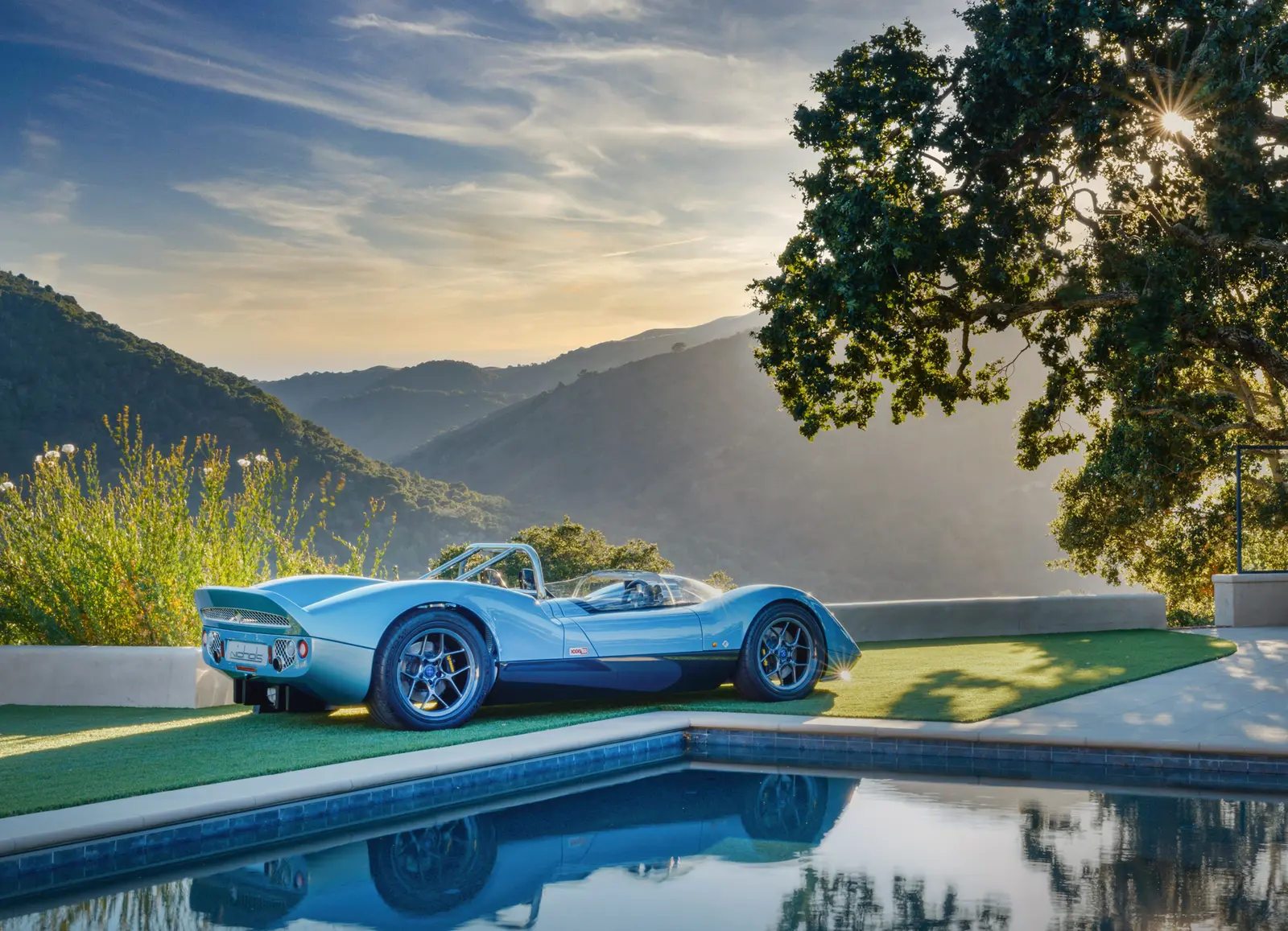 Vintage race car poolside in Carmel Valley — automotive photography by Manny Espinoza